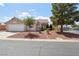Charming single-story home featuring a low-maintenance xeriscape front yard and attached two-car garage at 4753 Carefree Dr, Las Vegas, NV 89122