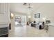 Spacious living area with tile flooring, neutral paint, and sliding glass doors to the outdoor patio space at 4753 Carefree Dr, Las Vegas, NV 89122