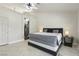 Spacious main bedroom boasting neutral colors, ceiling fan, and an en-suite bathroom at 4753 Carefree Dr, Las Vegas, NV 89122