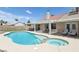 Inviting backyard pool and hot tub area perfect for relaxation and outdoor enjoyment on a sunny day at 4753 Carefree Dr, Las Vegas, NV 89122