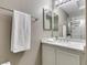 Bathroom featuring granite countertops and tiled shower at 507 Satin Saddle Pl, Henderson, NV 89052