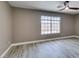 Spacious bedroom with wood-look flooring and natural light at 507 Satin Saddle Pl, Henderson, NV 89052
