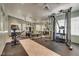 This gym features weight machines, free weights, and mirrors at 507 Satin Saddle Pl, Henderson, NV 89052