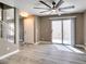 Inviting living space with backyard access, neutral paint, and staircase to the upper level at 507 Satin Saddle Pl, Henderson, NV 89052
