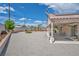 Spacious backyard featuring gravel, desert landscaping, perimeter wall and covered patio at 5139 Zapata Ln, North Las Vegas, NV 89031