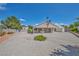 Large backyard with gravel ground cover and covered patio area at 5139 Zapata Ln, North Las Vegas, NV 89031