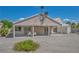 Backyard features covered patio with seating area and storage shed at 5139 Zapata Ln, North Las Vegas, NV 89031