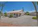 Backyard showing covered patio with outdoor furniture and gravel landscaping at 5139 Zapata Ln, North Las Vegas, NV 89031