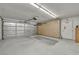 Spacious two-car garage with shelving and garage door opener at 5139 Zapata Ln, North Las Vegas, NV 89031