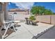 Relaxing patio space with comfortable seating, a unique water feature, and a serene atmosphere at 5139 Zapata Ln, North Las Vegas, NV 89031