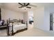 Bright bedroom featuring a comfortable bed and ensuite bathroom at 5409 Flora Spray St, Las Vegas, NV 89130