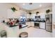 A kitchen that features stainless steel appliances and white cabinets at 5409 Flora Spray St, Las Vegas, NV 89130