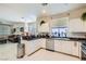 Open layout from the kitchen to the living room, great for entertaining at 5409 Flora Spray St, Las Vegas, NV 89130