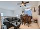 Upstairs living area featuring a bar, chairs, couch, and black coffee table at 5409 Flora Spray St, Las Vegas, NV 89130