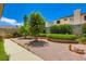 Lovely backyard featuring well-maintained garden beds and mature trees at 5413 Flora Spray St, Las Vegas, NV 89130