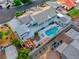 Beautiful home featuring a backyard pool, spa, and deck with lounge seating, perfect for outdoor entertaining at 5438 Sierra Brook Ct, Las Vegas, NV 89149