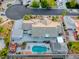 Aerial view of a home with an extended driveway and spacious backyard featuring a private pool and jacuzzi at 5438 Sierra Brook Ct, Las Vegas, NV 89149