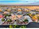 Aerial view of well-maintained home with desert landscaping and an extended driveway in a residential area at 5438 Sierra Brook Ct, Las Vegas, NV 89149