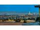 Expansive Las Vegas city view with visible landmarks, set against a backdrop of distant mountains at 5438 Sierra Brook Ct, Las Vegas, NV 89149
