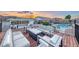 Elevated deck area featuring modern outdoor furniture and a fire pit with pool view, ideal for entertaining and relaxation at 5438 Sierra Brook Ct, Las Vegas, NV 89149