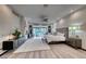 Bright main bedroom featuring hardwood floors, a comfortable bed, and modern decor at 5438 Sierra Brook Ct, Las Vegas, NV 89149