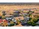Nice view of the desert neighborhood with many single-Gathering homes, desert landscaping and scenic views at 5438 Sierra Brook Ct, Las Vegas, NV 89149
