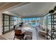 Bright office area featuring access to the pool and yard, modern decor, and plenty of natural light at 5438 Sierra Brook Ct, Las Vegas, NV 89149