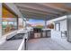 Impressive outdoor kitchen featuring stainless steel appliances and ample counter space, perfect for hosting and grilling at 5438 Sierra Brook Ct, Las Vegas, NV 89149