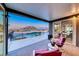 Inviting outdoor patio with scenic mountain views, a swimming pool, and comfortable seating at 5438 Sierra Brook Ct, Las Vegas, NV 89149