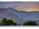 Scenic view of majestic mountains in the distance and partial neighborhood view at 5438 Sierra Brook Ct, Las Vegas, NV 89149