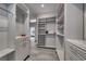 Spacious walk-in closet offering ample storage with custom shelving and drawers, plus a view to bedroom at 5438 Sierra Brook Ct, Las Vegas, NV 89149