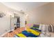 Cozy bedroom with a tidy closet and wood laminate floors at 5733 Dazzling Sparks St, North Las Vegas, NV 89031
