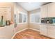 Breakfast nook with lots of natural light featuring white cabinets, and stainless steel appliances at 5733 Dazzling Sparks St, North Las Vegas, NV 89031