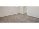 Bedroom with carpet flooring, white walls, and natural lighting at 6048 Aripeka St, Henderson, NV 89011