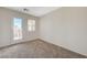 Bright room with access to balcony and featuring plush carpeting at 6048 Aripeka St, Henderson, NV 89011