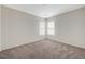 Bedroom featuring carpet, natural light and neutral walls at 6048 Aripeka St, Henderson, NV 89011