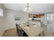 Open concept dining room connected to an updated kitchen at 6048 Aripeka St, Henderson, NV 89011