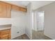 Bright kitchen area showing access to other rooms and ample counter space at 6048 Aripeka St, Henderson, NV 89011