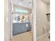 Spacious bathroom with a large vanity and tiled floor at 6068 Conroe Ct, Las Vegas, NV 89118