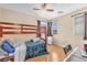 Cozy bedroom featuring a wood frame bunk bed and lots of natural light at 6068 Conroe Ct, Las Vegas, NV 89118