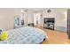 Large bedroom featuring a television and hardwood flooring at 6068 Conroe Ct, Las Vegas, NV 89118