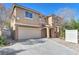 Charming two-story house with a spacious driveway, two-car garage, and inviting curb appeal at 6068 Conroe Ct, Las Vegas, NV 89118