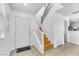 Bright foyer features a staircase and tile flooring at 6068 Conroe Ct, Las Vegas, NV 89118