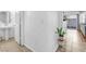 Hallway area with white walls and entry to the bathroom and living room at 6068 Conroe Ct, Las Vegas, NV 89118