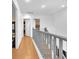 Bright hallway with hardwood floors connects to multiple rooms at 6068 Conroe Ct, Las Vegas, NV 89118