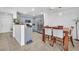 Open-concept kitchen and dining area, with stainless steel appliances and a functional layout at 6068 Conroe Ct, Las Vegas, NV 89118