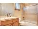 Neutral bathroom with tile, updated fixtures, shower-tub combination, and natural light at 6120 Kings Brook Ct, Las Vegas, NV 89149