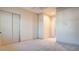 Neutral bedroom featuring closet with bifold doors and neutral colored carpet at 6120 Kings Brook Ct, Las Vegas, NV 89149