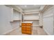 Walk-in closet with custom shelving and storage, offering an organized space at 6120 Kings Brook Ct, Las Vegas, NV 89149