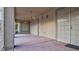 Spacious covered patio area with ceiling fans and secure gated entry at 6120 Kings Brook Ct, Las Vegas, NV 89149